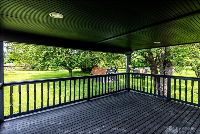 6399 Kimberly Dr, Fairfield Twp, OH 45011 - wooden deck with a shed, an outbuilding, and a lawn