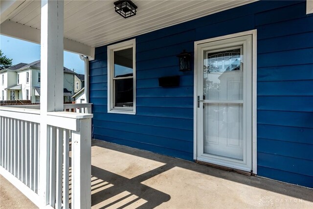 919 Summer St, Hamilton, OH 45013 - property entrance with a porch