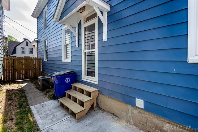 919 Summer St, Hamilton, OH 45013 - view of patio with entry steps, fence, and central AC