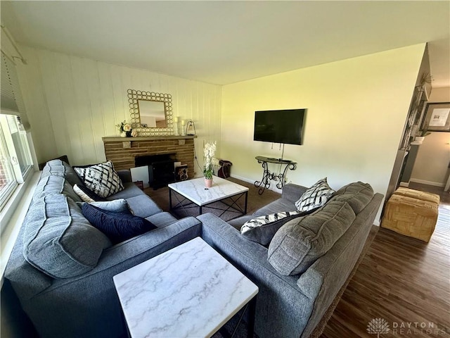 4065 Locustwood Dr, Dayton, OH 45429 - living area featuring a fireplace, wood finished floors, and baseboards