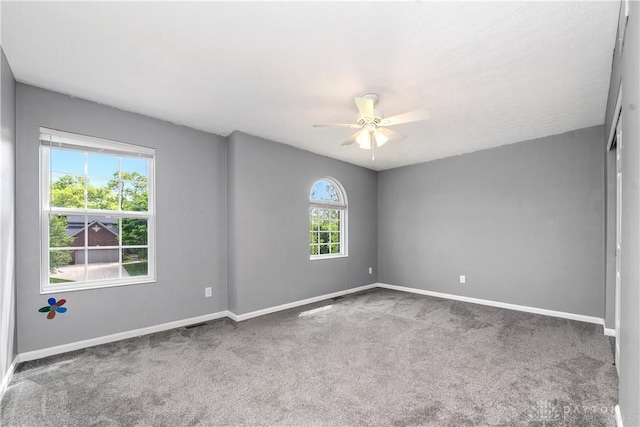 5065 Cross Creek Ln, Miami Township, OH 45150 - empty room featuring baseboards, a ceiling fan, and carpet