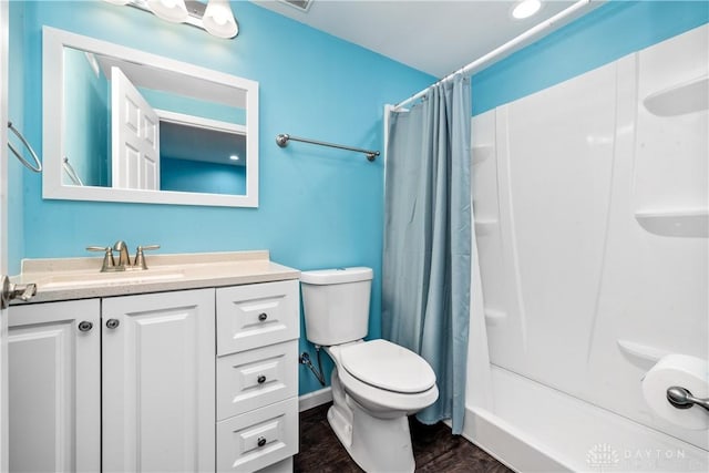 5065 Cross Creek Ln, Miami Township, OH 45150 - bathroom with wood finished floors, toilet, vanity, and a shower with shower curtain