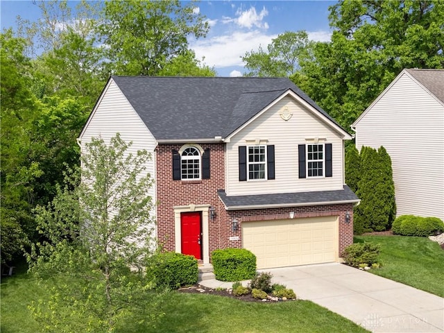 5065 Cross Creek Ln, Miami Township, OH 45150 - traditional-style home with a garage, roof with shingles, concrete driveway, and brick siding