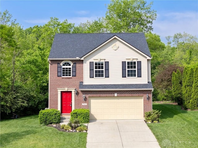 5065 Cross Creek Ln, Miami Township, OH 45150 - view of front of property featuring a garage, brick siding, driveway, and a shingled roof