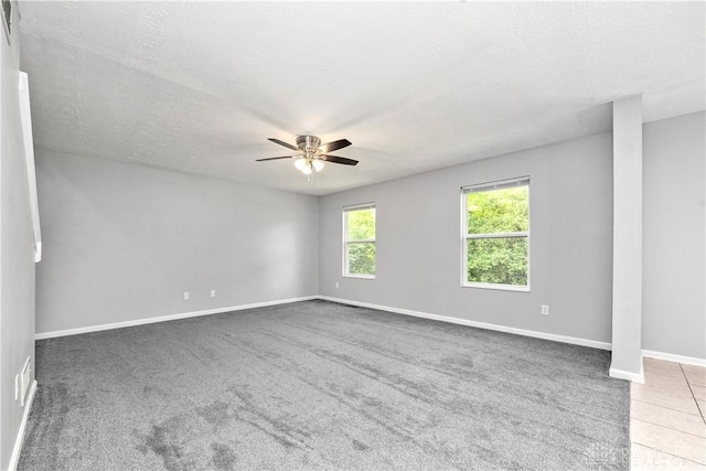 5065 Cross Creek Ln, Miami Township, OH 45150 - carpeted empty room with a ceiling fan, baseboards, and a textured ceiling