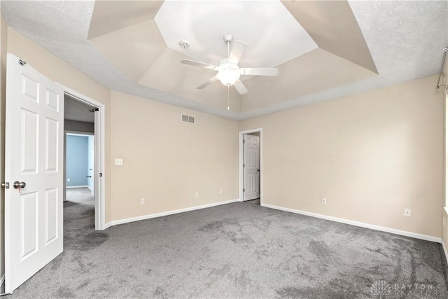 5065 Cross Creek Ln, Miami Township, OH 45150 - unfurnished bedroom featuring a tray ceiling, carpet floors, and baseboards