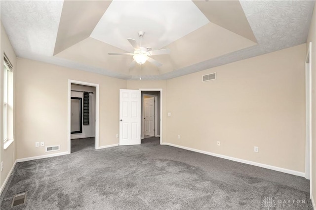 5065 Cross Creek Ln, Miami Township, OH 45150 - unfurnished bedroom with a tray ceiling, carpet, and baseboards
