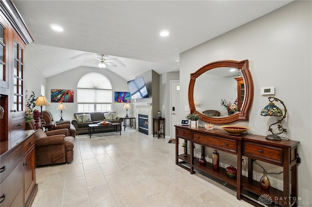 hall featuring lofted ceiling and recessed lighting