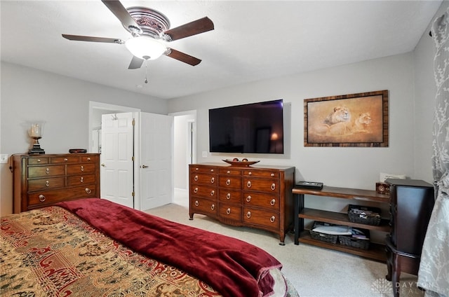 bedroom featuring carpet flooring and a ceiling fan