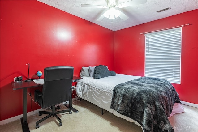 82 Choctaw Cir, Franklin, OH 45005 - carpeted bedroom featuring a textured ceiling, baseboards, ceiling fan, and an office area
