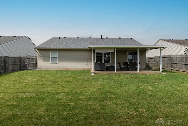 82 Choctaw Cir, Franklin, OH 45005 - back of house with a patio area and a shingled roof