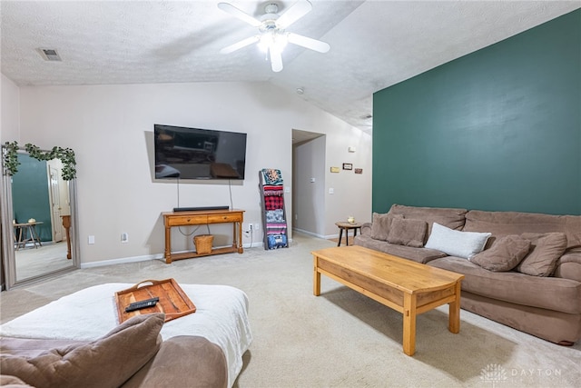82 Choctaw Cir, Franklin, OH 45005 - living room with light colored carpet, vaulted ceiling, ceiling fan, baseboards, and a textured ceiling