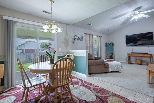 82 Choctaw Cir, Franklin, OH 45005 - dining room with tile patterned floors, lofted ceiling, a chandelier, carpet, and ceiling fan