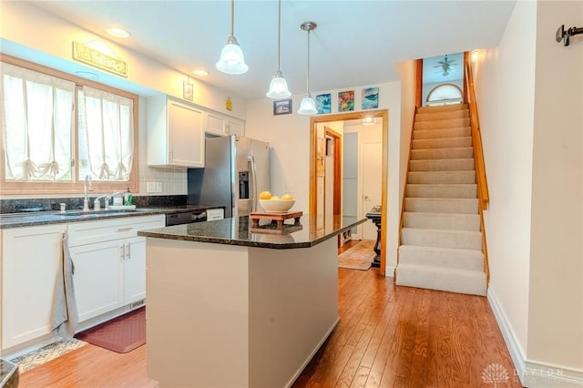 849 Wind Blf, Springboro, OH 45066 - kitchen with stainless steel refrigerator with ice dispenser, a sink, white cabinets, light wood-style flooring, and recessed lighting