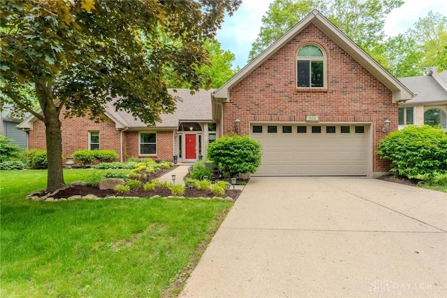849 Wind Blf, Springboro, OH 45066 - traditional-style home with an attached garage, brick siding, driveway, and a front lawn