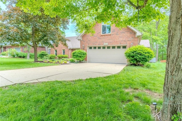 849 Wind Blf, Springboro, OH 45066 - traditional-style house featuring brick siding, driveway, a front yard, and an attached garage