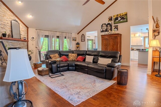 849 Wind Blf, Springboro, OH 45066 - living room featuring wood finished floors, high vaulted ceiling, ceiling fan, and a fireplace