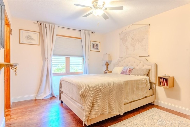 849 Wind Blf, Springboro, OH 45066 - bedroom featuring baseboards, wood finished floors, and a ceiling fan