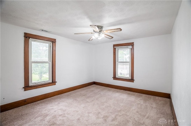 20 N 10th St, Miamisburg, OH 45342 - empty room with carpet, baseboards, ceiling fan, and a textured ceiling