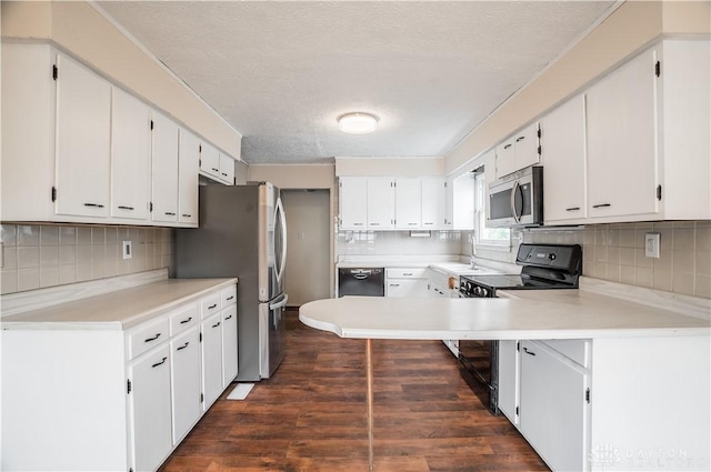 20 N 10th St, Miamisburg, OH 45342 - kitchen with black appliances, tasteful backsplash, a textured ceiling, light countertops, and dark wood-type flooring