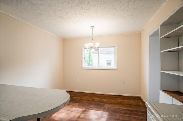 20 N 10th St, Miamisburg, OH 45342 - unfurnished dining area featuring wood finished floors, a chandelier, a textured ceiling, baseboards, and ornamental molding