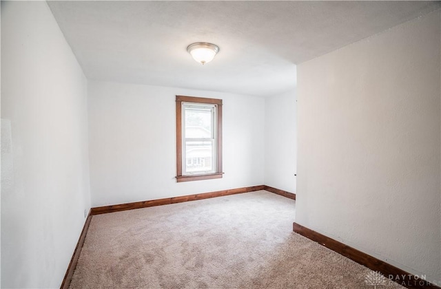 20 N 10th St, Miamisburg, OH 45342 - carpeted empty room featuring baseboards