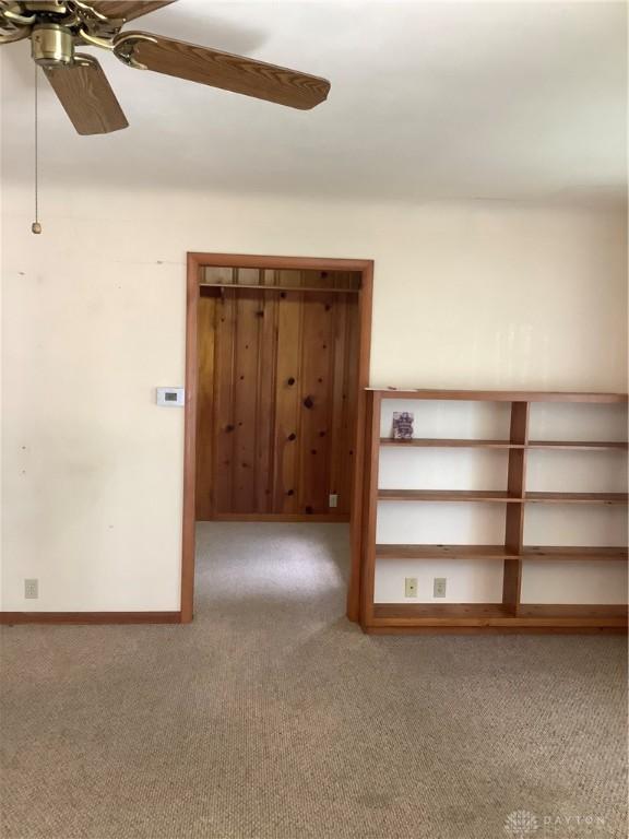 109 Anderson St, New Madison, OH 45346 - carpeted spare room featuring ceiling fan and baseboards