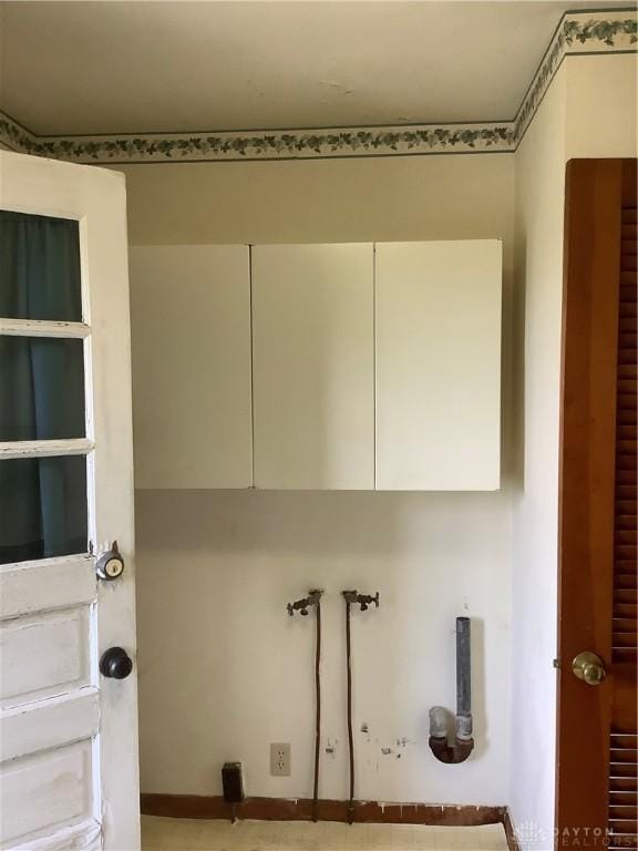 109 Anderson St, New Madison, OH 45346 - clothes washing area with cabinet space and hookup for a washing machine