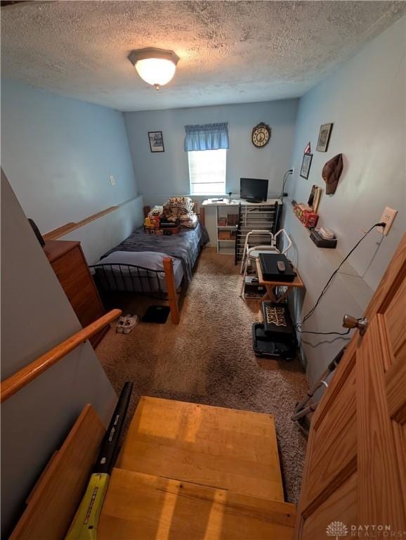 7430 S Kessler Fred Rd, West Milton, OH 45383 - bedroom with a textured ceiling and carpet floors