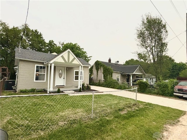 view of front of property with a front lawn and covered porch