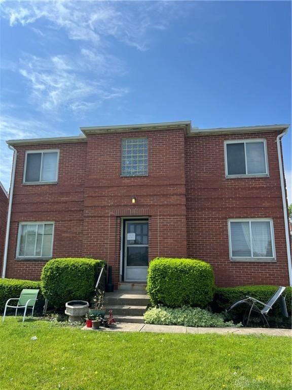 120 E Dorothy Ln, Kettering, OH 45419 - view of front of home featuring a front lawn and brick siding