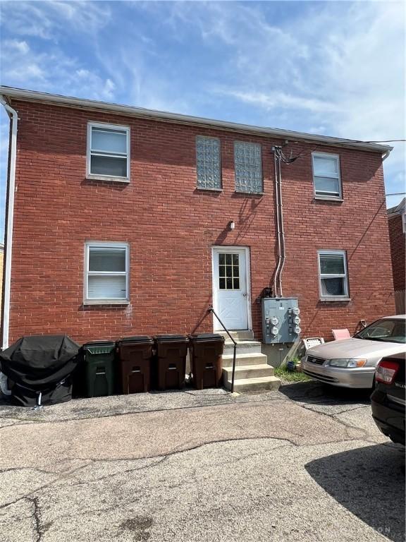 120 E Dorothy Ln, Kettering, OH 45419 - rear view of house with brick siding