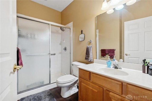 2684 Cedarbrook Way, Beavercreek, OH 45431 - bathroom with a shower stall, vanity, and wood finished floors