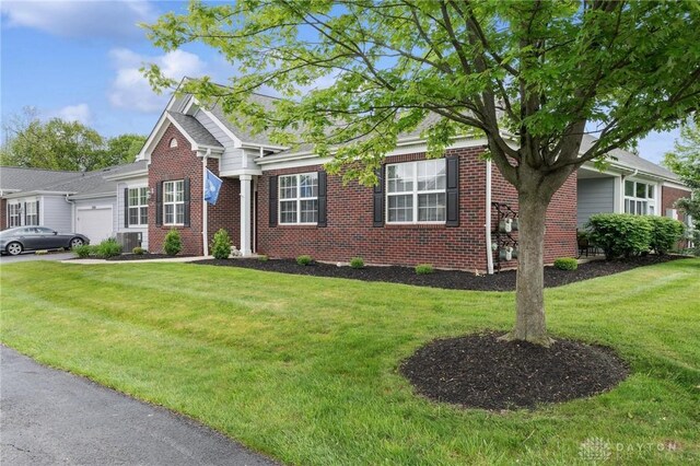 2684 Cedarbrook Way, Beavercreek, OH 45431 - view of front of house featuring brick siding, a garage, and a front yard