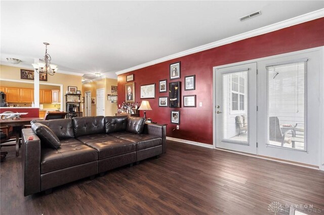 2684 Cedarbrook Way, Beavercreek, OH 45431 - living room with a chandelier, wood finished floors, and ornamental molding