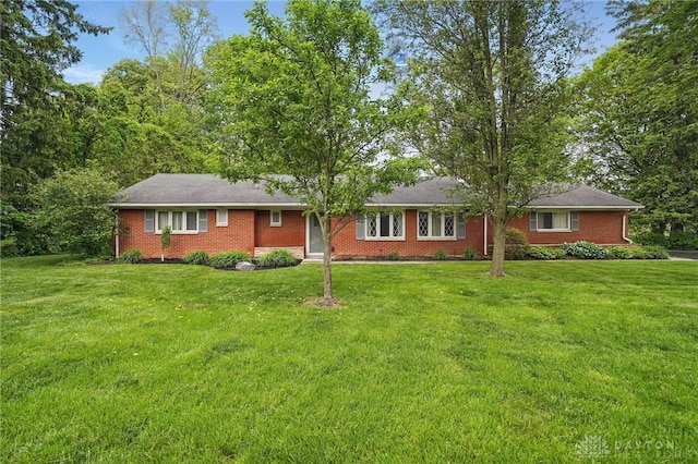 141 W Rahn Rd, Washington Twp, OH 45429 - ranch-style house featuring a front yard and brick siding