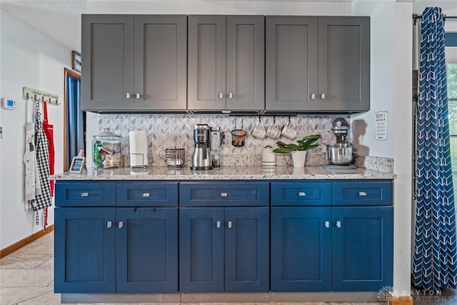 1493 N Sulphur Springs Rd, West Alexandria, OH 45381 - bar area featuring decorative backsplash and baseboards