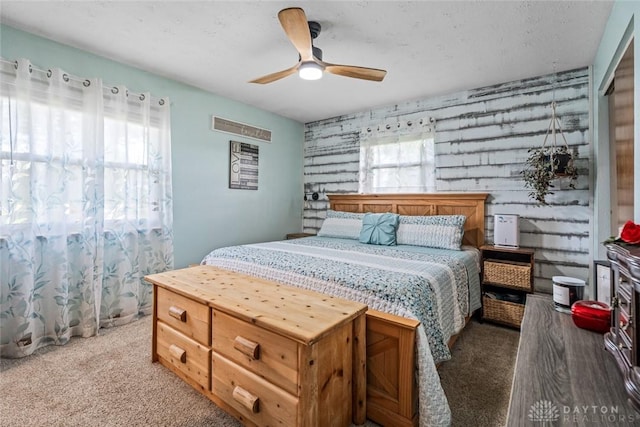 1493 N Sulphur Springs Rd, West Alexandria, OH 45381 - bedroom featuring carpet floors, an accent wall, and ceiling fan