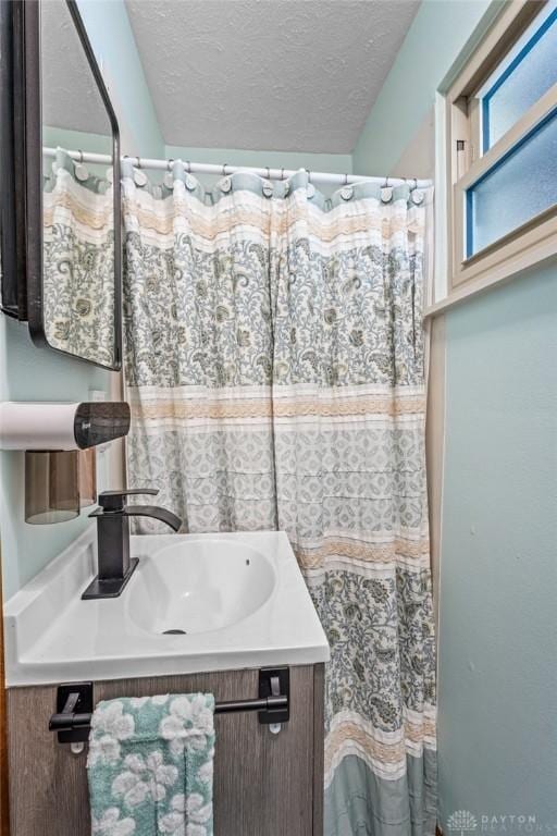 1493 N Sulphur Springs Rd, West Alexandria, OH 45381 - bathroom featuring vanity, a textured ceiling, and a shower with shower curtain
