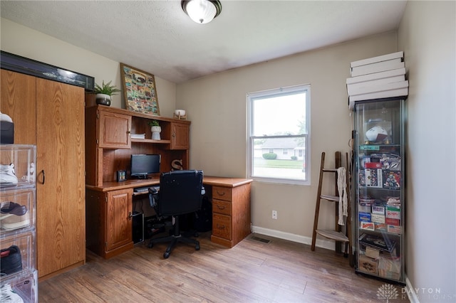 1139 Chalet Dr, New Carlisle, OH 45344 - office area with light wood finished floors and baseboards