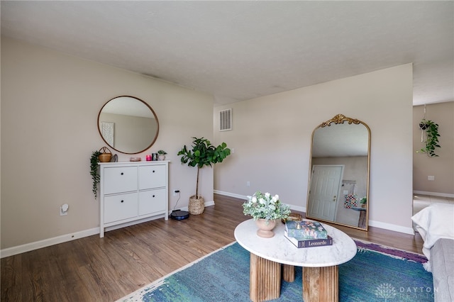 1139 Chalet Dr, New Carlisle, OH 45344 - sitting room with wood finished floors, baseboards, and arched walkways