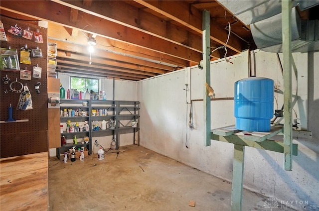 below grade area featuring a water pressure tank