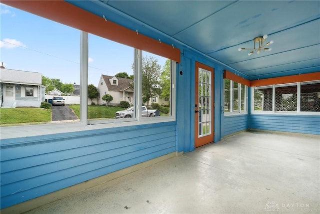 4119 Pleasant View Ave, Dayton, OH 45420 - unfurnished sunroom featuring a chandelier