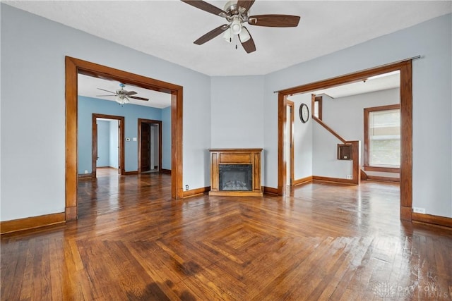 4119 Pleasant View Ave, Dayton, OH 45420 - unfurnished living room featuring a ceiling fan, baseboards, and a fireplace