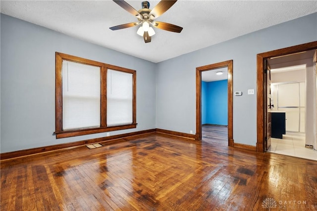 4119 Pleasant View Ave, Dayton, OH 45420 - spare room with baseboards, ceiling fan, and hardwood / wood-style floors