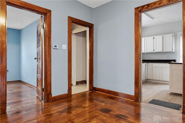 4119 Pleasant View Ave, Dayton, OH 45420 - hallway featuring wood finished floors and baseboards