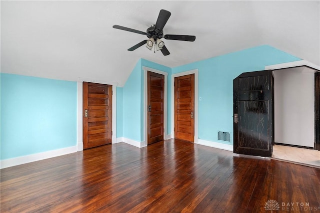 4119 Pleasant View Ave, Dayton, OH 45420 - unfurnished living room featuring lofted ceiling, wood finished floors, a ceiling fan, and baseboards