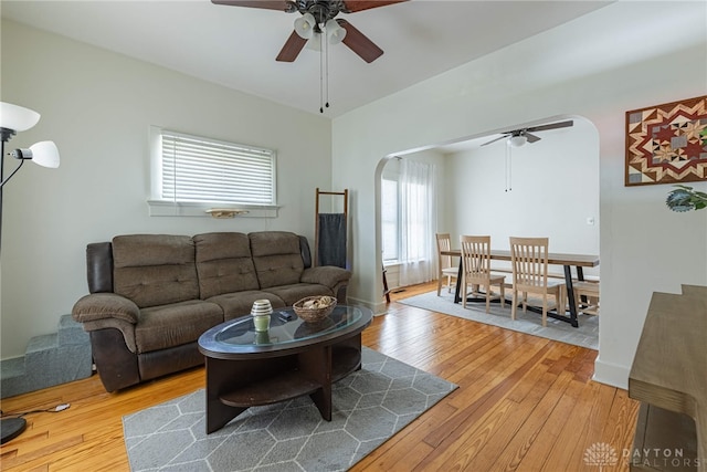 2526 Saint Charles Ave, Dayton, OH 45410 - living area with arched walkways, a ceiling fan, and light wood-style flooring