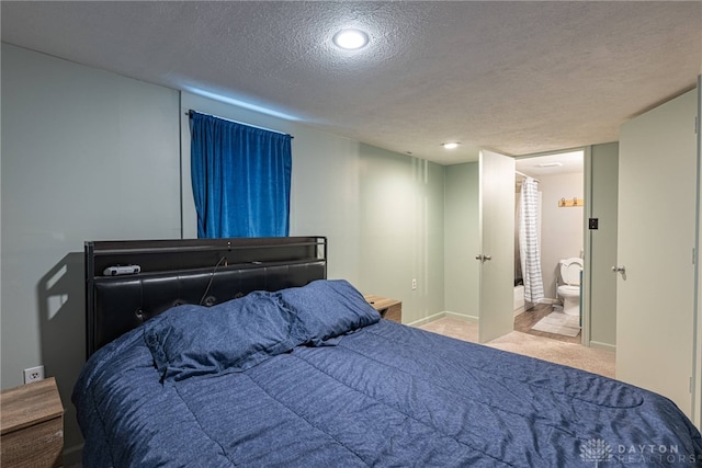 2526 Saint Charles Ave, Dayton, OH 45410 - carpeted bedroom featuring a textured ceiling and baseboards