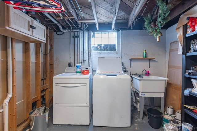 2526 Saint Charles Ave, Dayton, OH 45410 - laundry area featuring independent washer and dryer and cabinet space